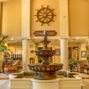 a bright yellow room with a water fountain