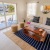 a living room with a large glass door