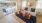 a living room with a large glass door